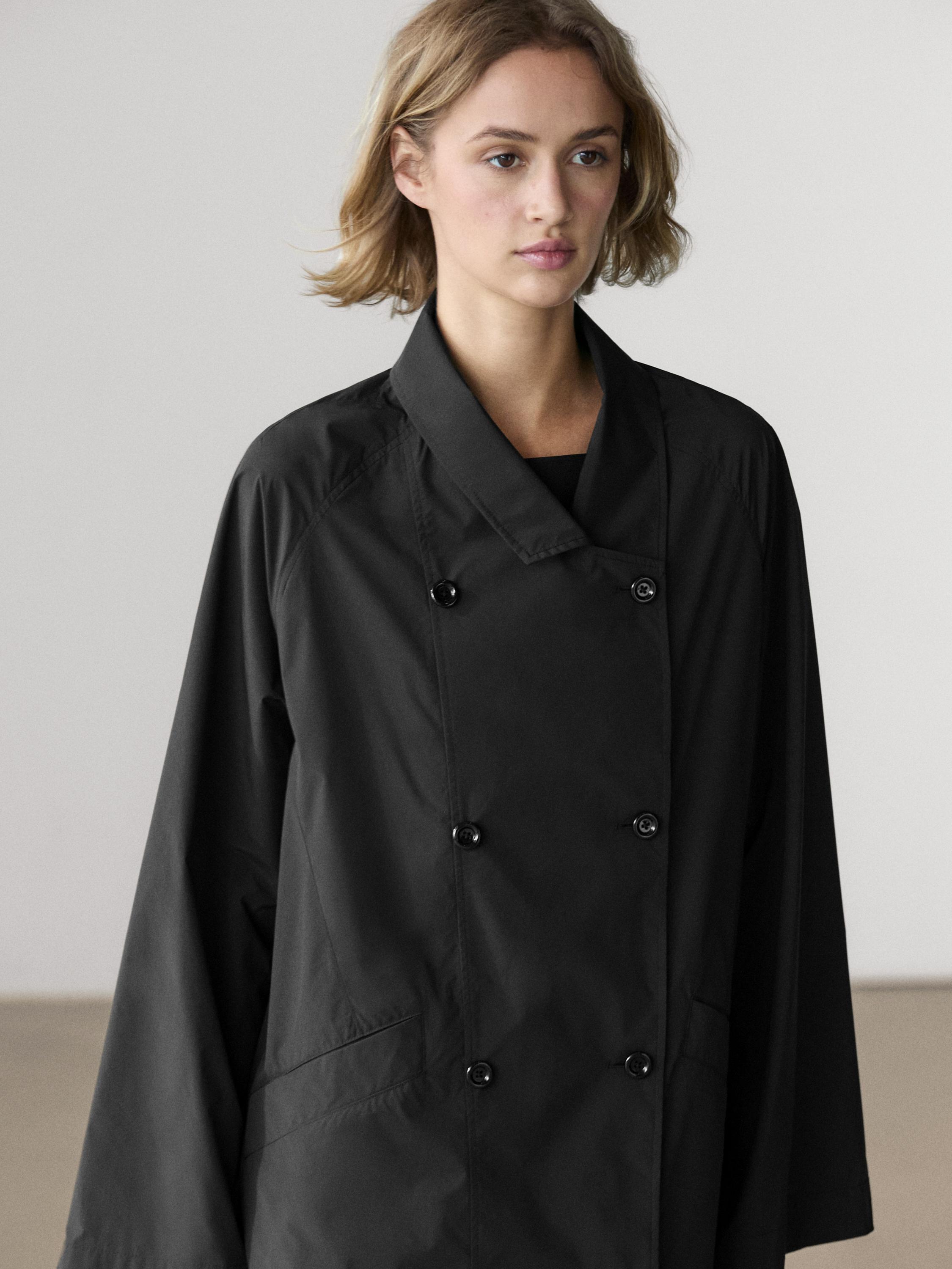 Double-breasted technical trench coat